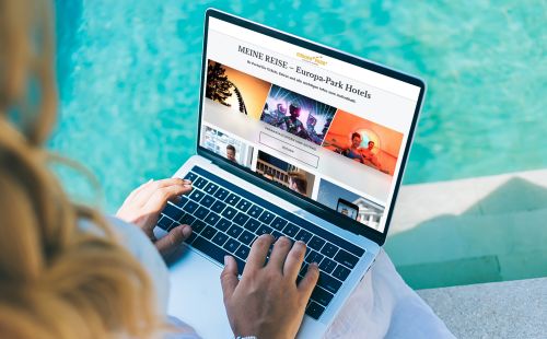 Laptop mit MEINE REISE Portal offen