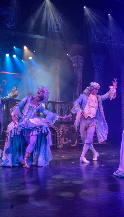 Several dancing and singing performers on the SPOOK ME! stage.