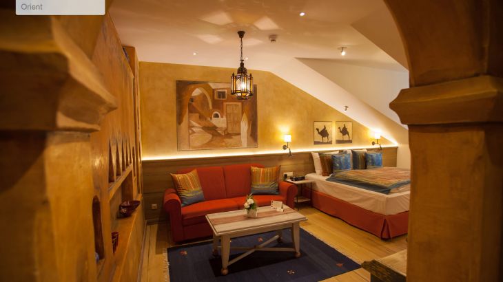 Themensuite Hotel Bell Rock Wohn- und Schlafzimmer