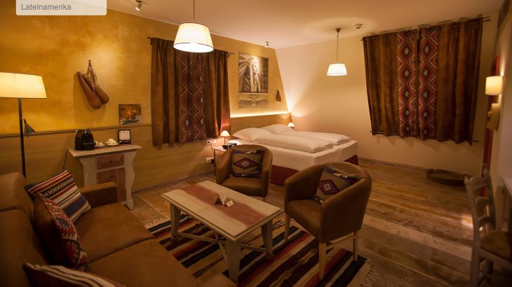 Themensuite Hotel Bell Rock Wohn- und Schlafzimmer