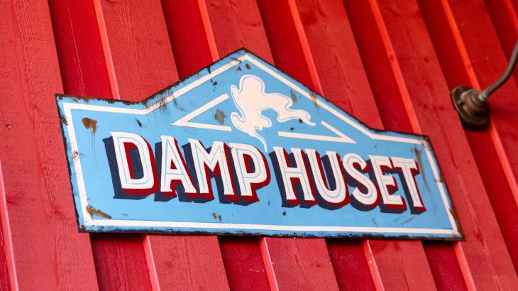 Schild "Damp Huset"