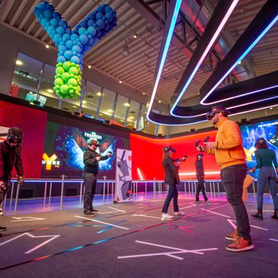 People in the blue fire Dome are playing YULLBE GO.