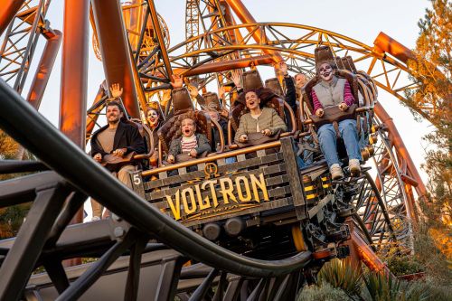 Excited riders on the Voltron Nevera rollercoaster, powered by Rimac, in the Croatian themed area of Europa-Park.