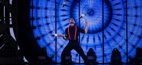 Man juggling with cones